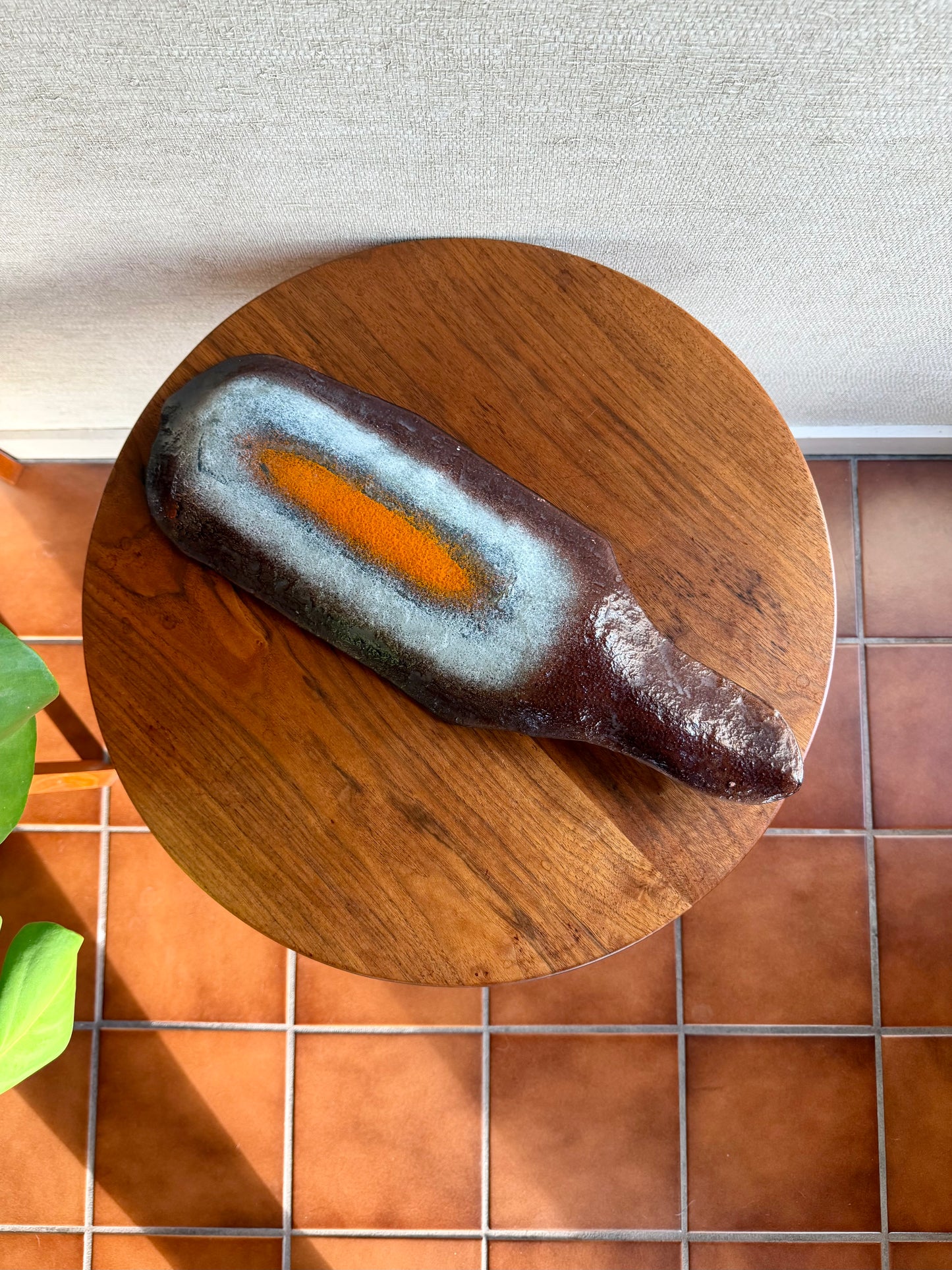 bottom of glass tray on wooden table