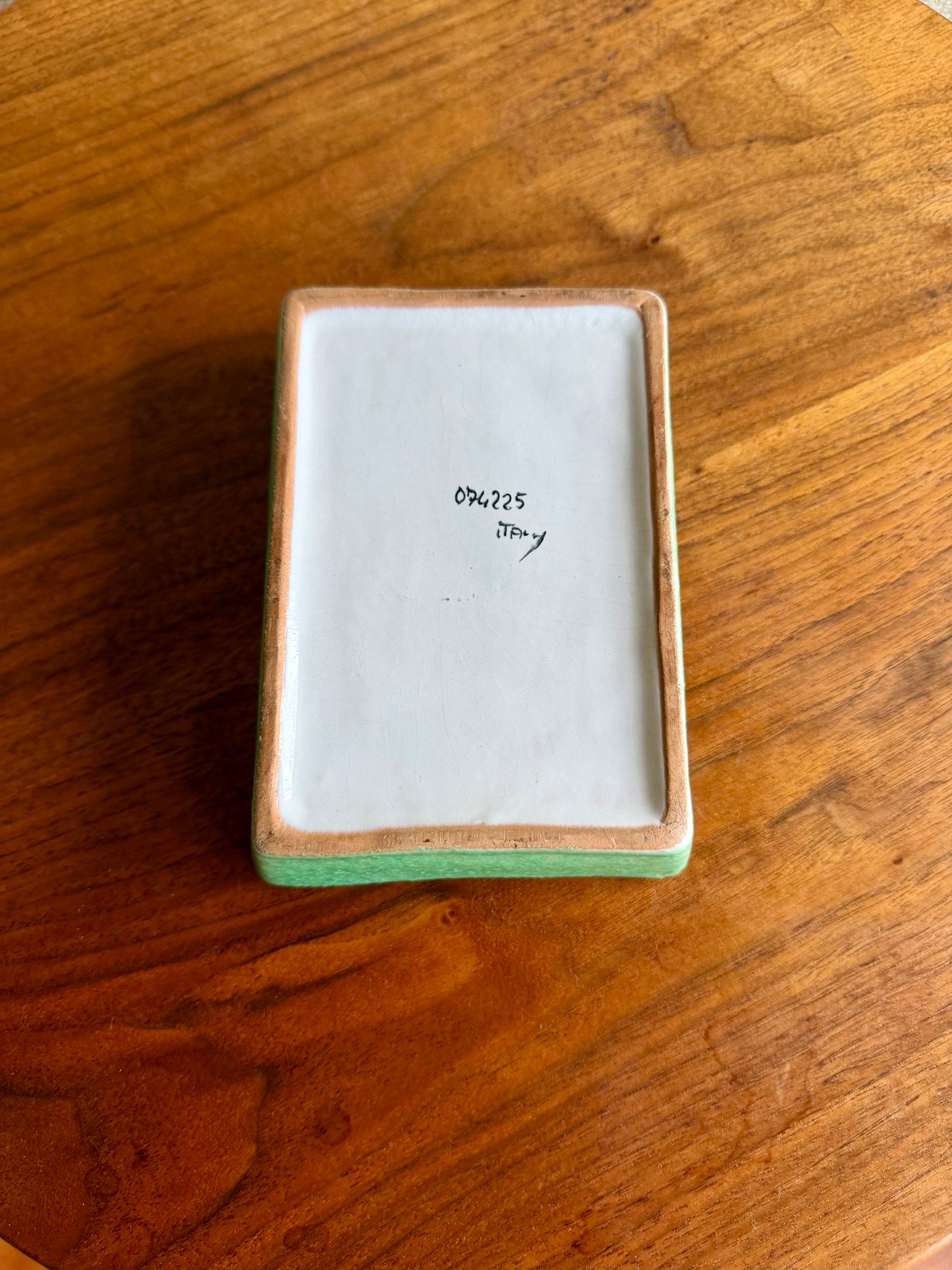 Small rectangular ceramic dish on a wooden surface