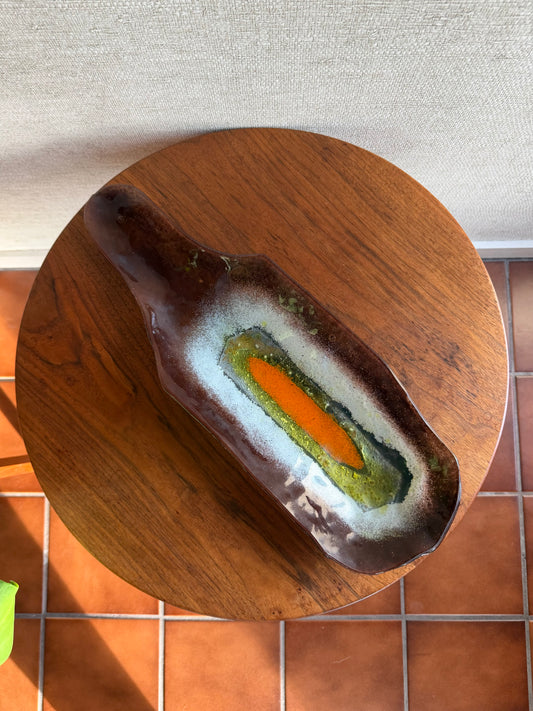 decorative colorful glass tray on wood table