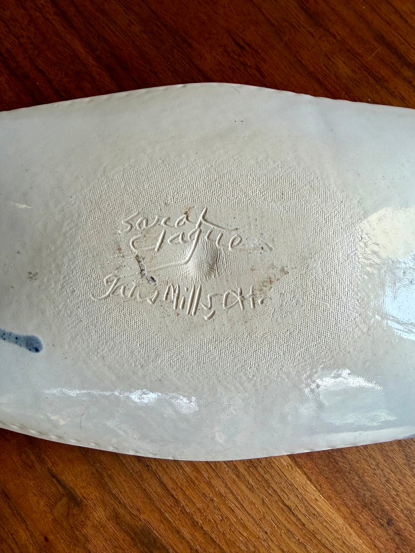 Bottom of pottery tray signed Sarah Clague Gates Mills, Ohio 