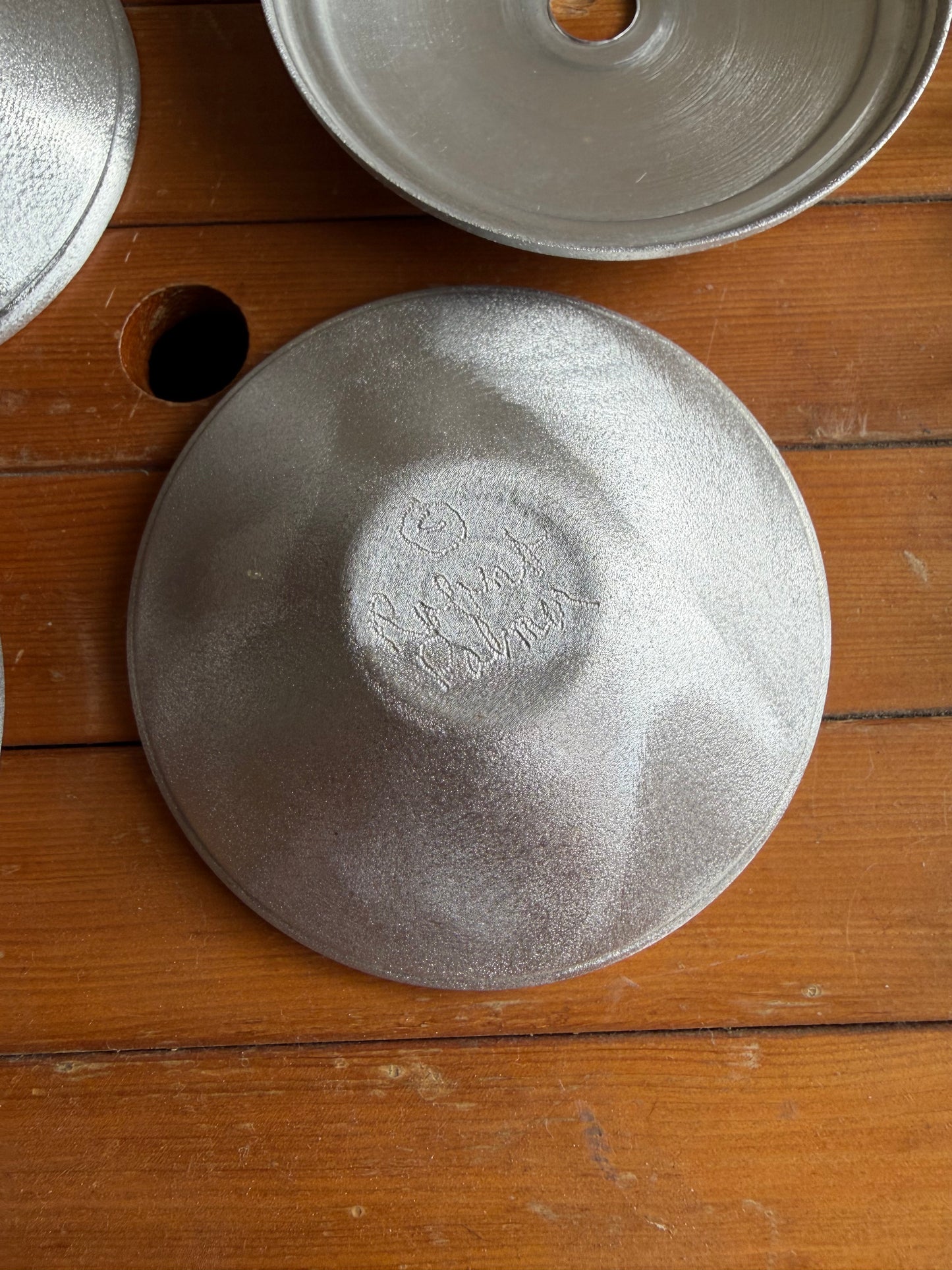 Two ceramic bowls on a wooden surface