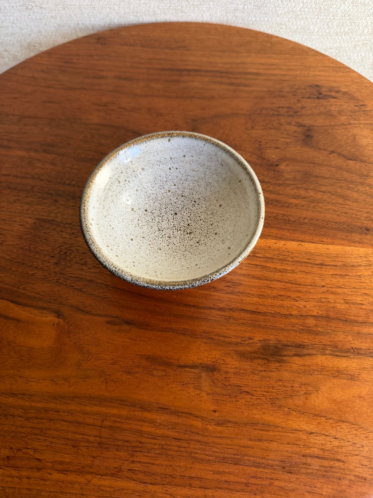White Ceramic bowl on a wooden table