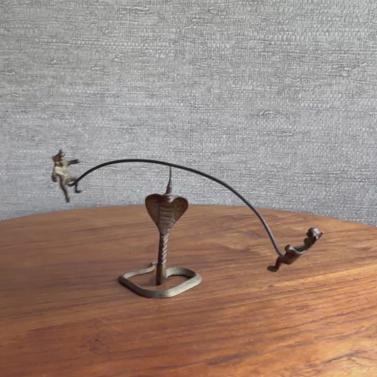 video of balancing bears on a king cobra 