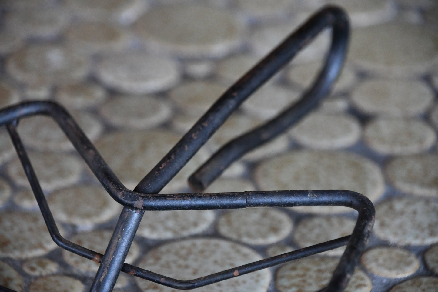 detail shot of black metal leaf basket