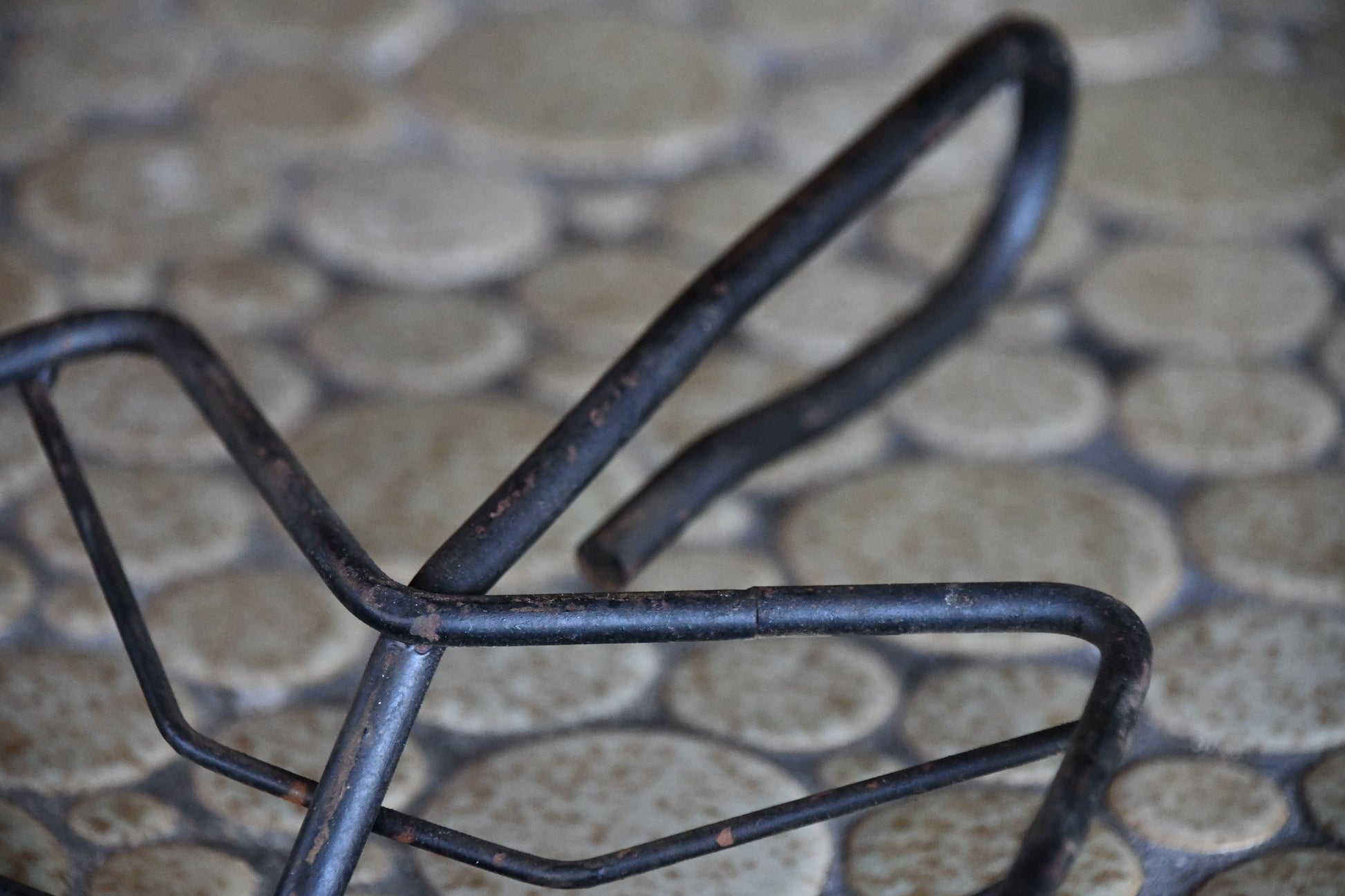 detail shot of black metal leaf basket
