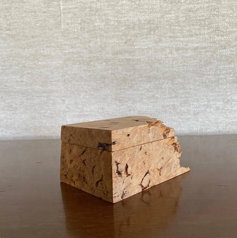 wood box on a brown wood table